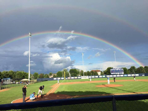 Bill Ryan working under a double rainbow