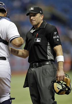MLB Umpire Chris Guccione red pen in pocket