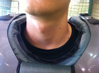 This umpire chest protector fits better around the neck
